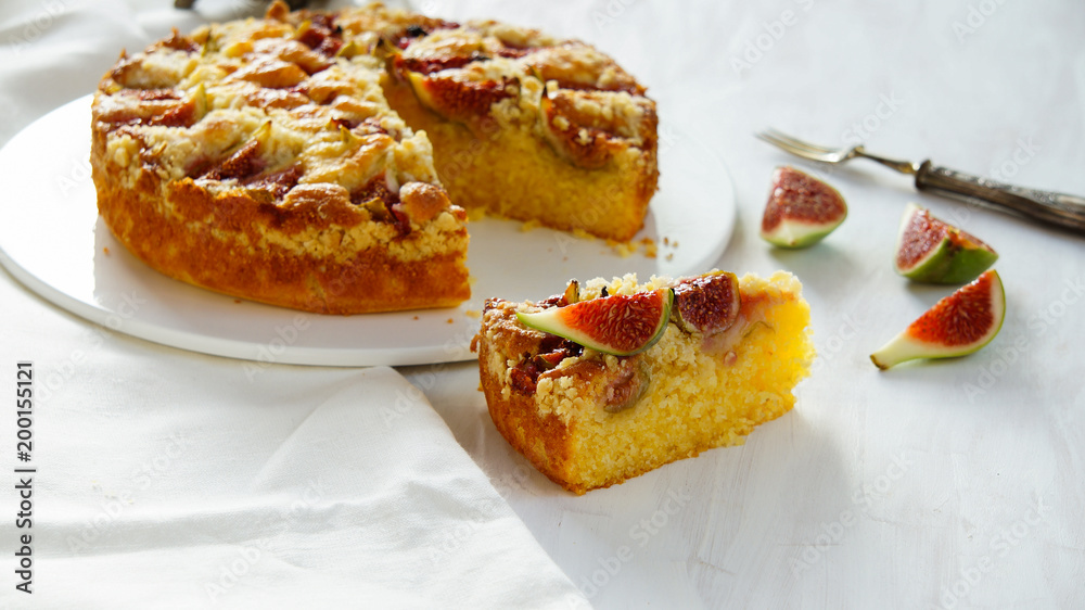 corn flour pie with figs, streusel, gluten free, without wheat, white bakeground silver corn flour pie with figs, streusel, gluten free, without wheat, white bakeground silver