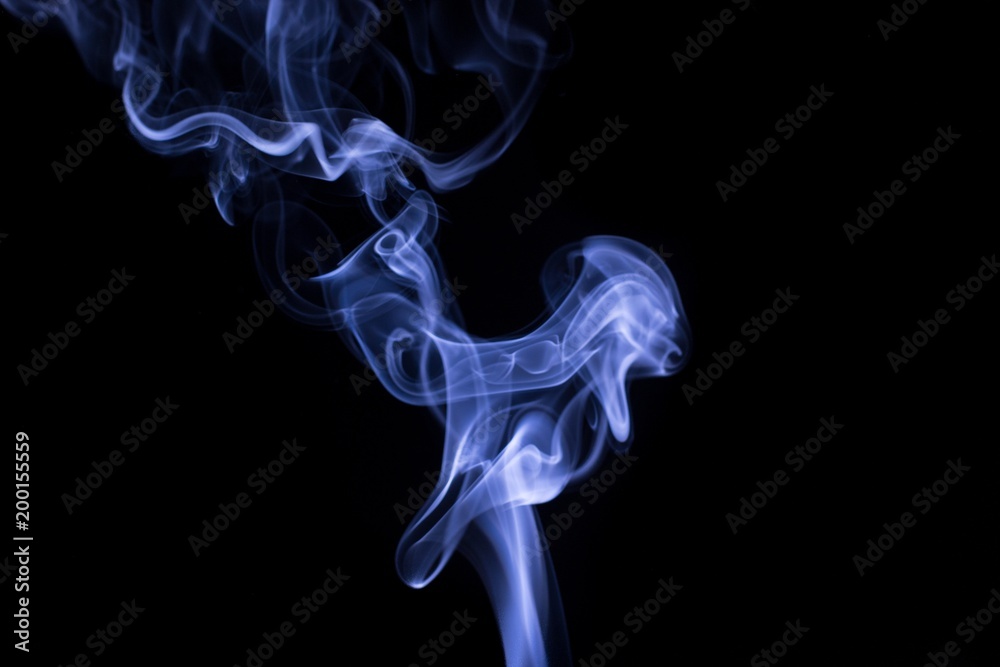 Colored smoke on black background Colored smoke on black background