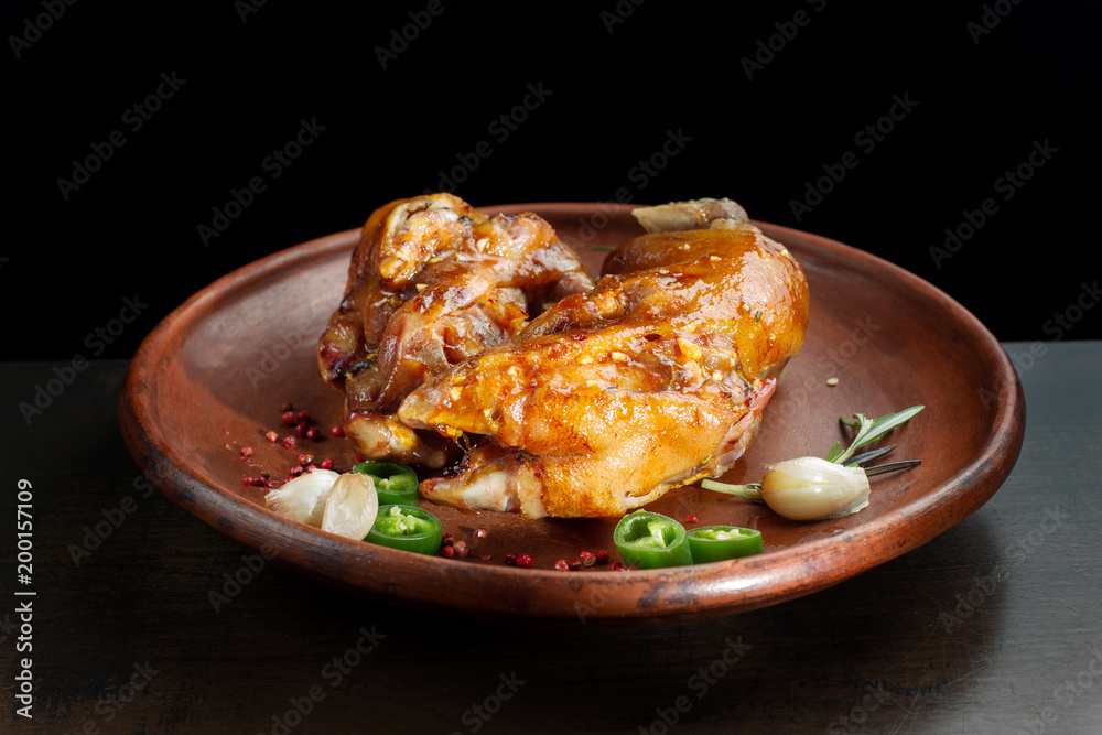 Stew leg pork on a beautiful clay plate. Stew leg pork on a beautiful clay plate.