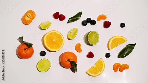 Wallpaper Mural Fruits animated on white background isolated: orange, mandarin, lime, bluberry and raspberry Torontodigital.ca