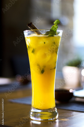 Glass of orange juice with mint