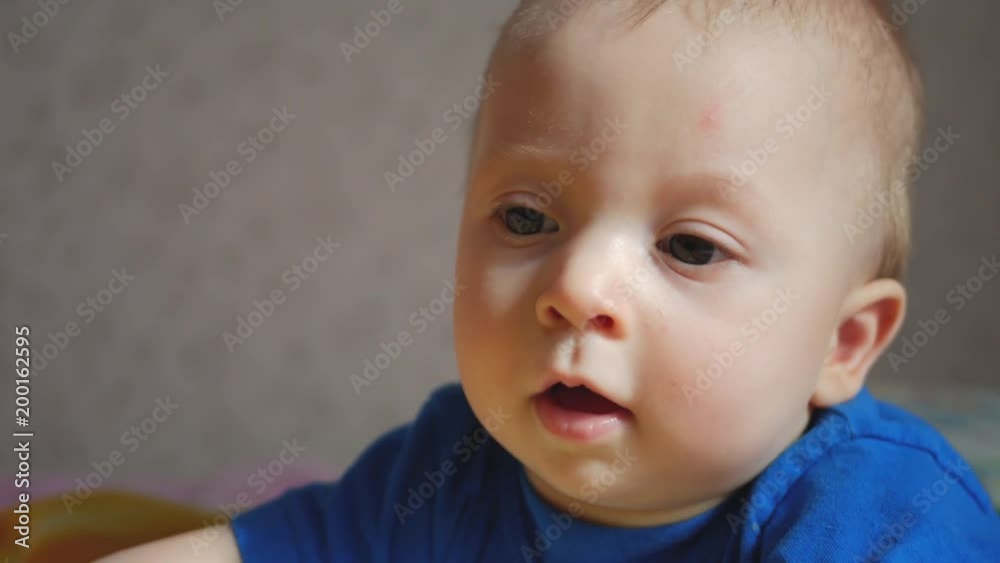 Adorable little boy playing in children room Adorable little boy playing in children room