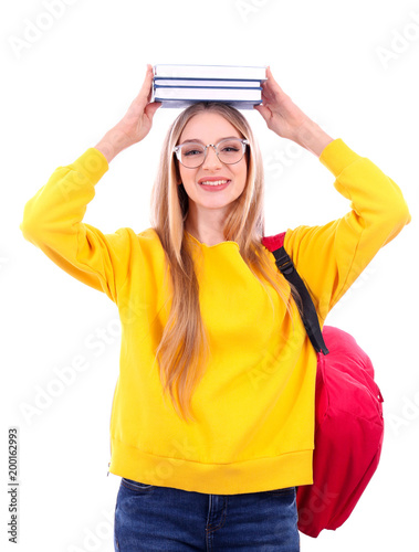 Student with books and backpack on white background. Preparing for exam