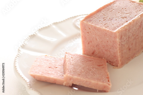 Sliced luncheon meat on dish