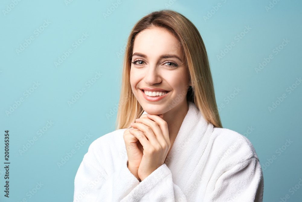 Beautiful young woman with silky skin on color background Beautiful young woman with silky skin on color background