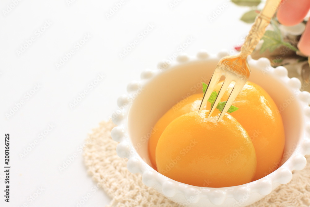 peach on bowl for dessert image peach on bowl for dessert image