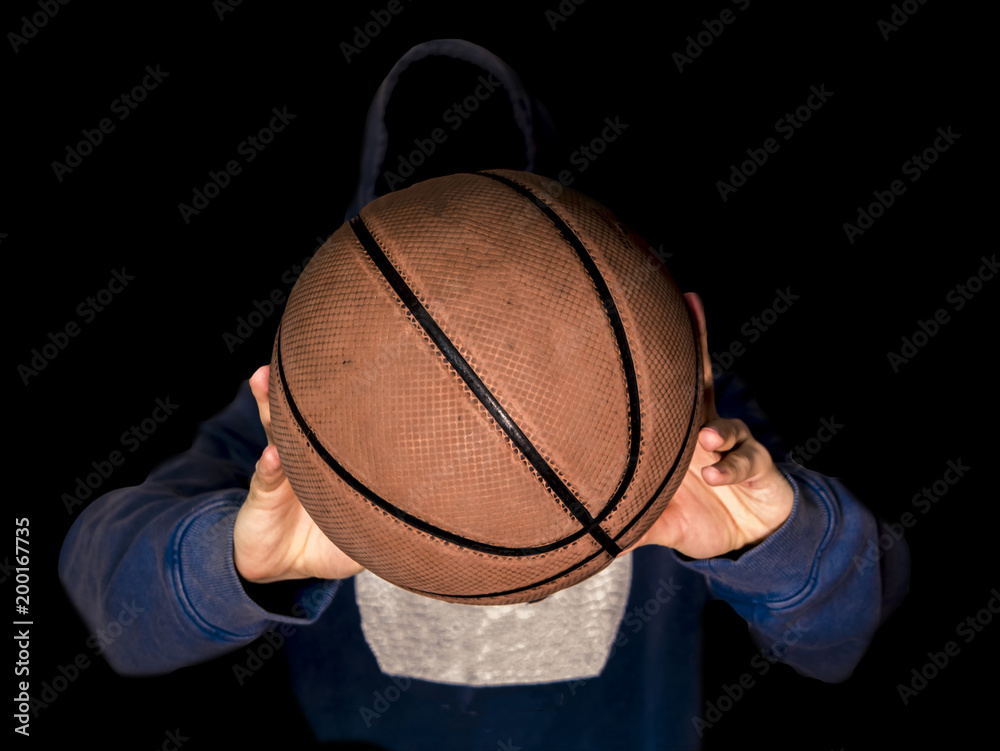 close up portrait man passing the ball in dark background