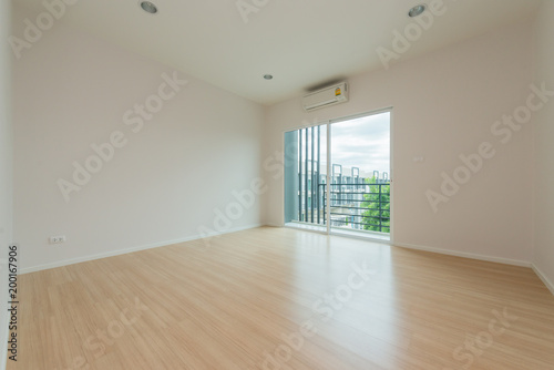 Empty bright living room without furniture