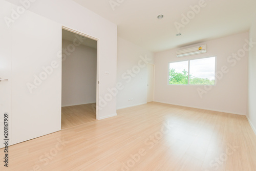 Empty bright living room without furniture