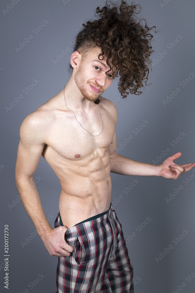 Young athletic ginger in pyjamas man studio portrait Young athletic ginger in pyjamas man studio portrait