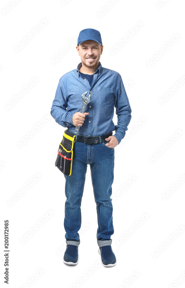 Plumber with tool belt and wrench on white background Plumber with tool belt and wrench on white background