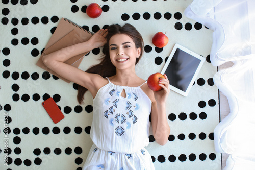 Beautiful young woman with ...