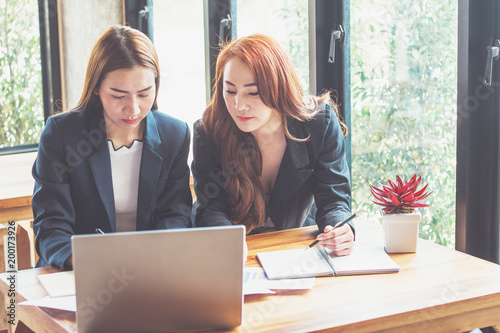 Business young woman agree to be partner,Sales manager are presenting export items to partner,Investors joint venture with customers,Secretary contacted the work successfully.