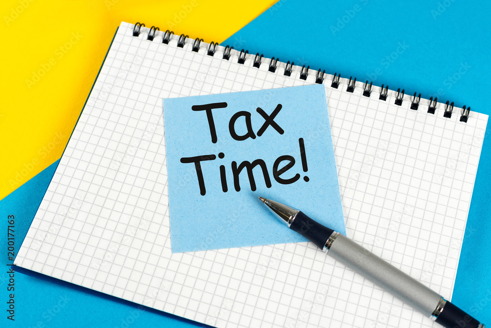 tax time, reminder at manager or accauntant workplace. Tax planning and budgeting concept tax time, reminder at manager or accauntant workplace. Tax planning and budgeting concept