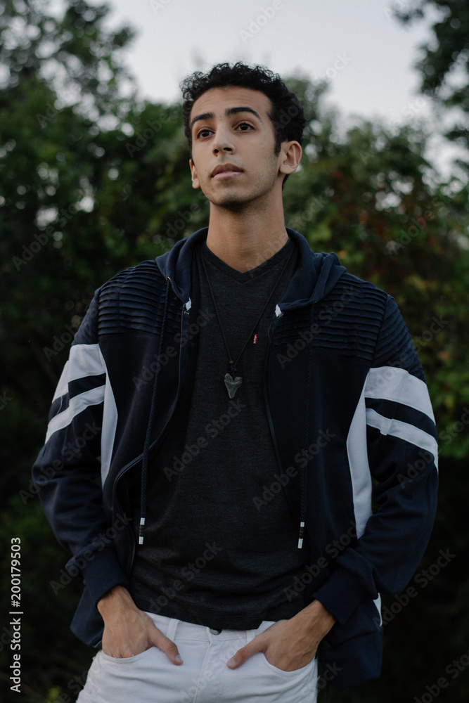 Young Male Modeling in Black and White Jacket Young Male Modeling in Black and White Jacket