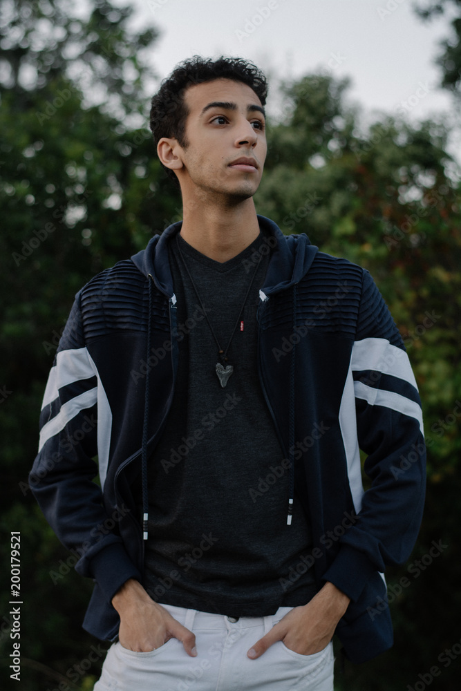 Young Male Modeling in Black and White Jacket Young Male Modeling in Black and White Jacket