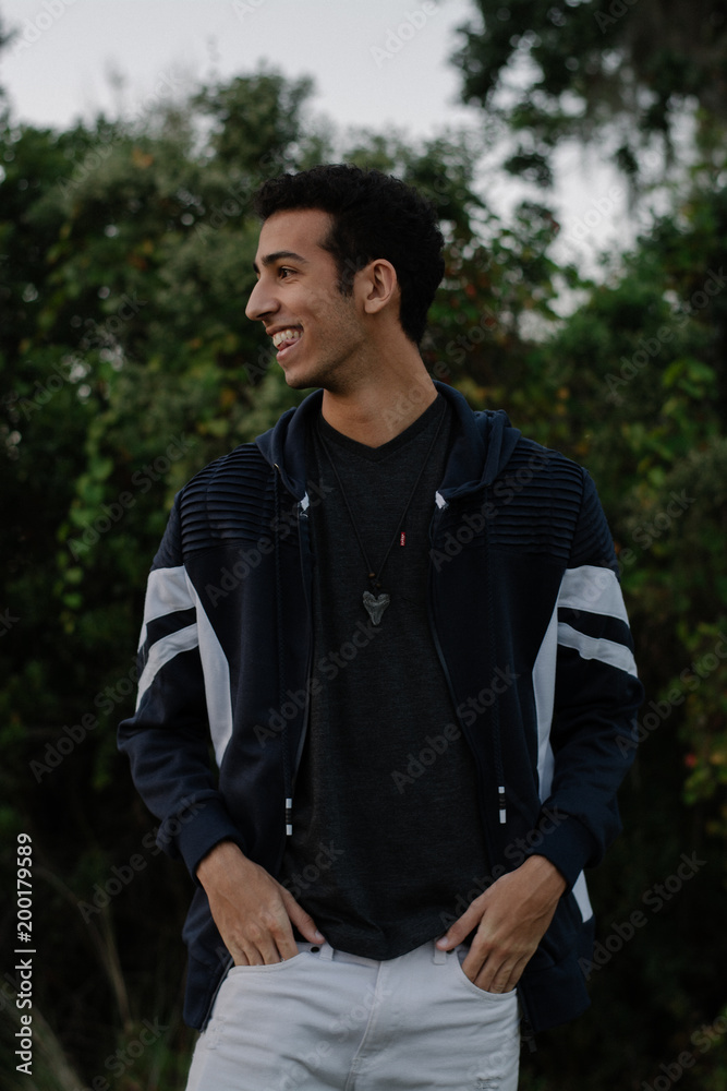 Young Male Modeling in Black and White Jacket Young Male Modeling in Black and White Jacket
