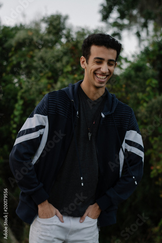 Young Male Modeling in Black and White Jacket