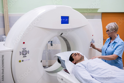 Patient entering mri scan machine photo