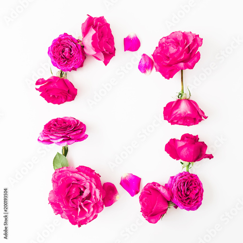 Floral frame of pink roses on white background. Flat lay  Top view. Valentines day composition