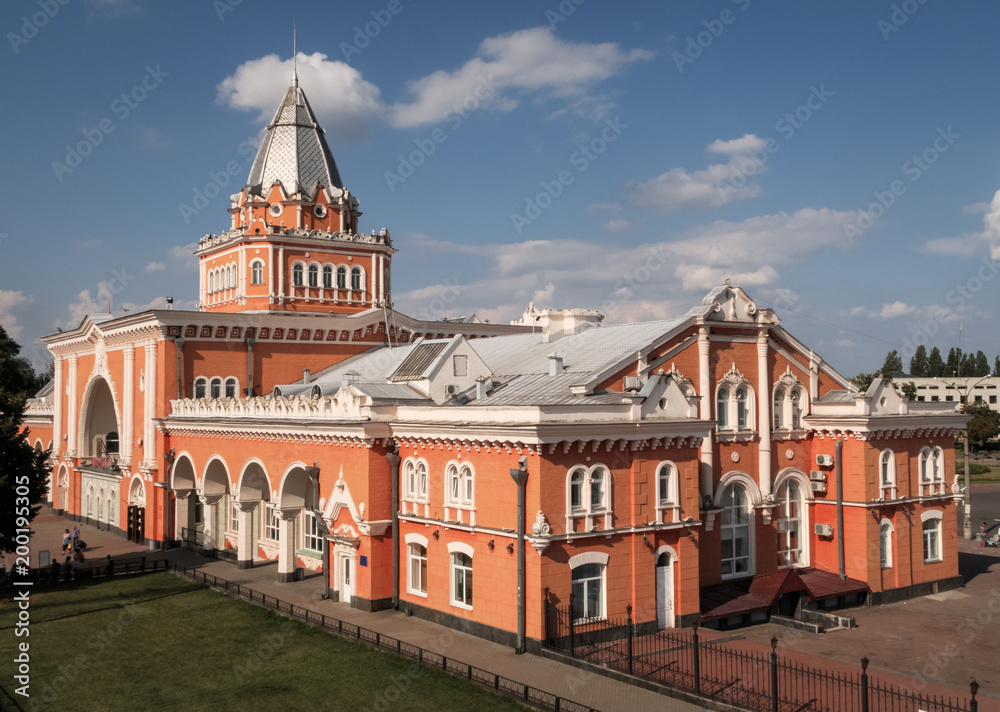 An architectural monument is the railway station of Chernigov, Ukraine. It was built in the 20th century in the Neo-Russian style. Captured at sunny summer day. Travel Ukraine.