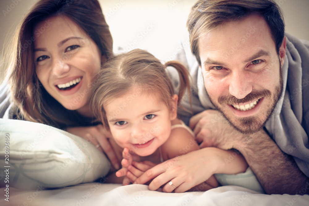 Portrait of young family.