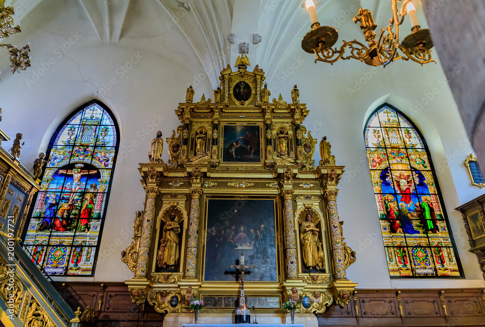 Stained glass windows and the altar of the German Church in Stockholm Sweden