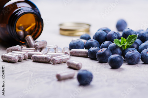 Biologically active supplement - pills for healthy eyes photo