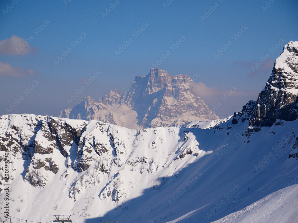 Mount Pelmo over a snowy ridge