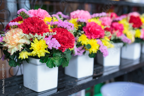 Fototapeta Naklejka Na Ścianę i Meble -  Colorful flower bouquets in vases