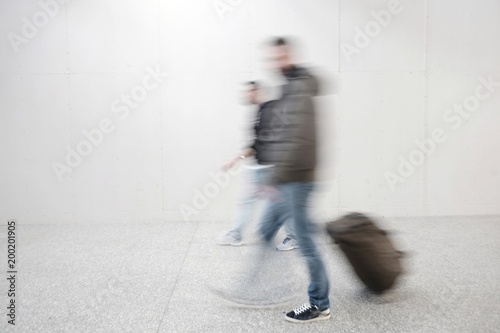 blurred people at the airport