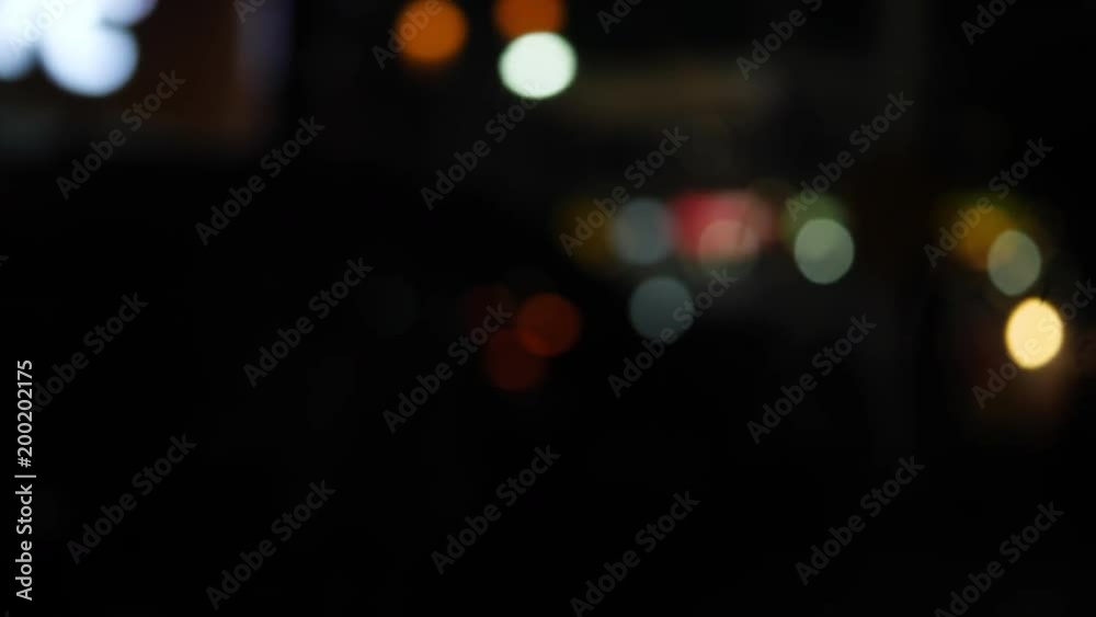 abstract blur light bokeh roadside the street with car driving in night city abstract blur light bokeh roadside the street with car driving in night city