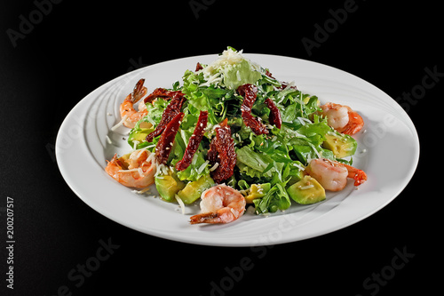 Shrimp and avocado salad and parsley. Low fat healthy eating concept.
