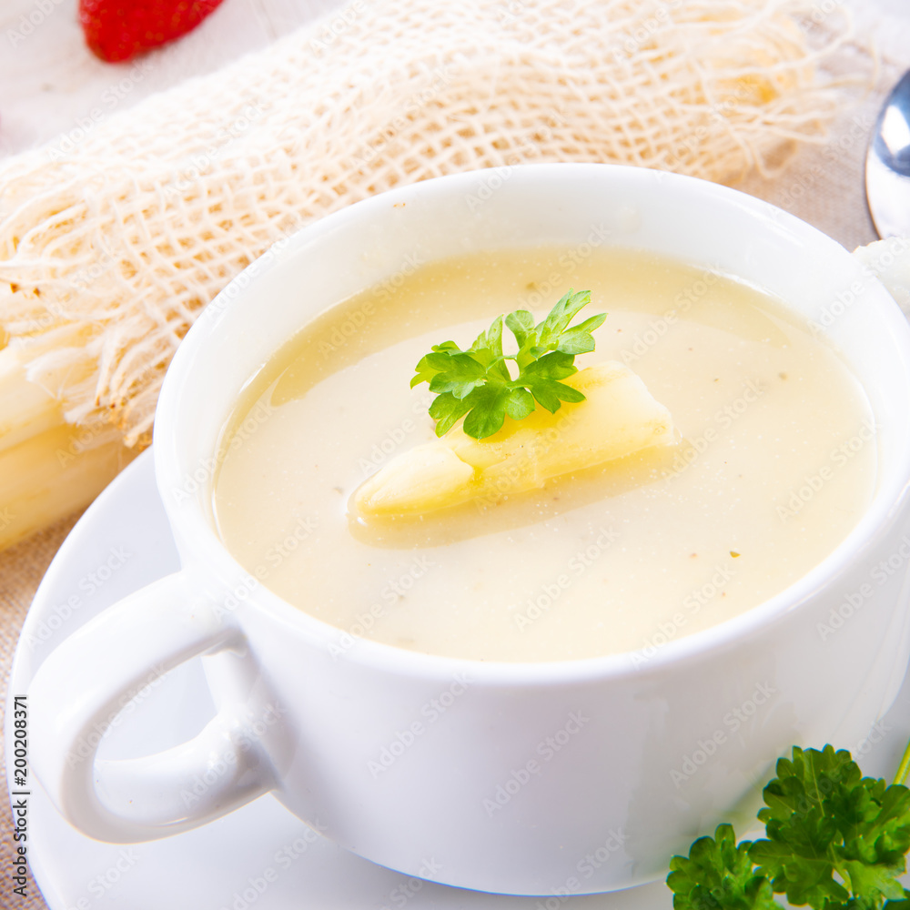 asparagus cream soup with capers and fresh baguette asparagus cream soup with capers and fresh baguette