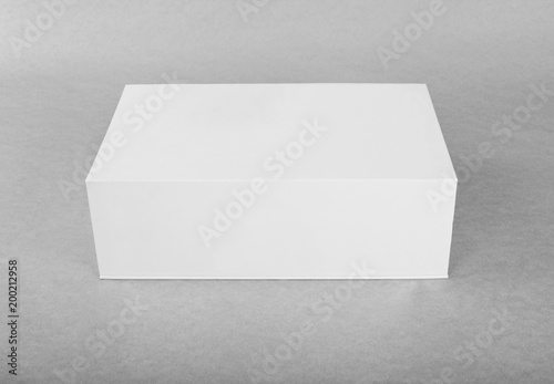 Close up of a white box template on grey background.