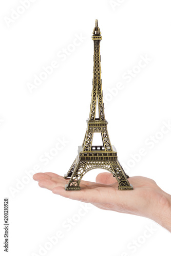 Paris Eiffel tower souvenir in hand