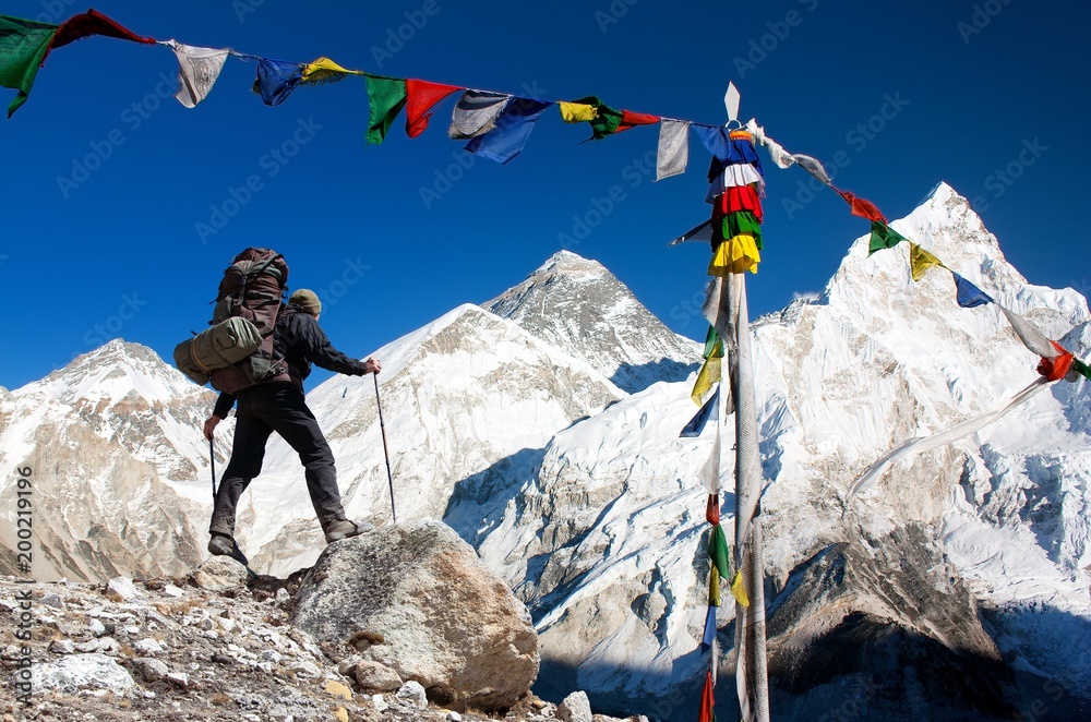 Mount Everest with tourist and prayer flags - obrazy, fototapety, plakaty 