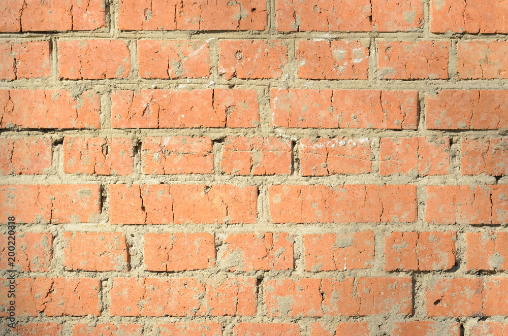 Old orange brickwork with different defects Old orange brickwork with different defects