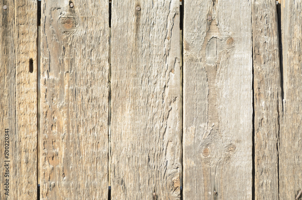 Naklejka premium Background from brown wooden boards with texture