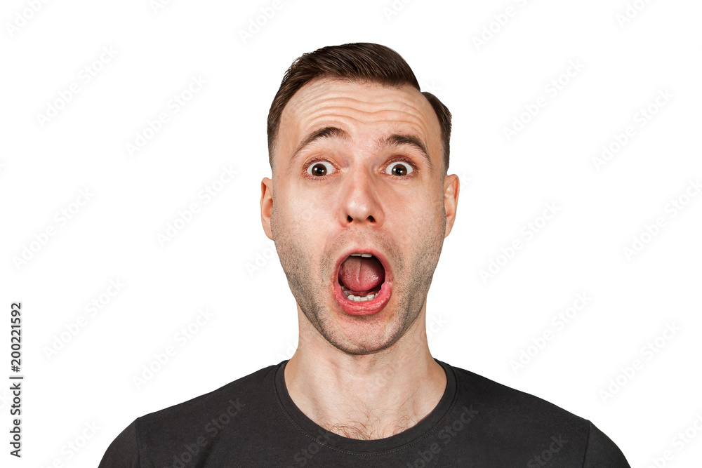 Funny young guy with opened mouth and wide eyes, isolated on white background. Funny young guy with opened mouth and wide eyes, isolated on white background.