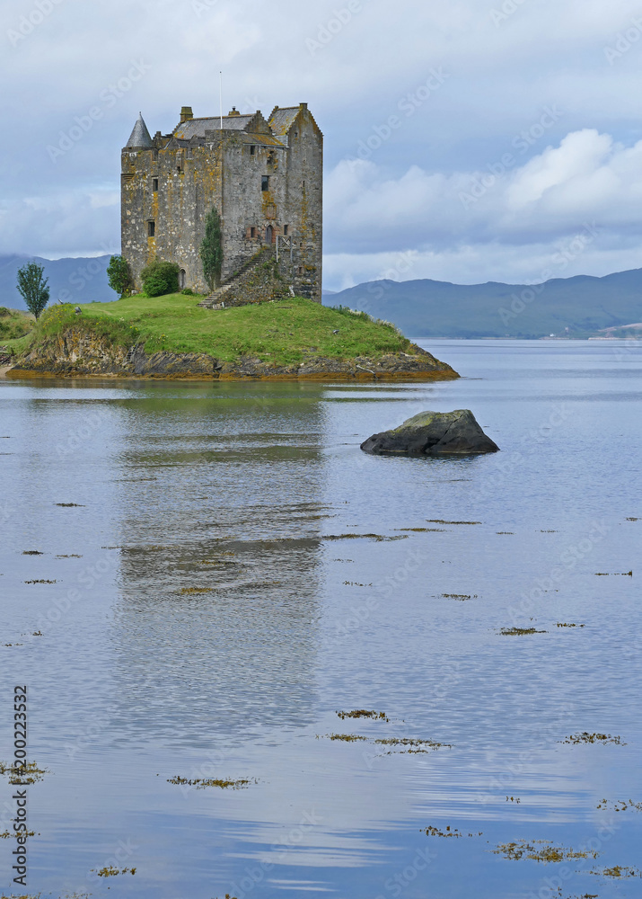 Scotland, Castle Stalker is a four-storey tower house or keep picturesquely set on a tidal islet on Loch Laich, an inlet off Loch Linnhe