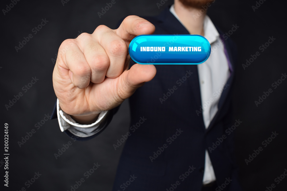 A businessman shows an inscription:INBOUND MARKETING A businessman shows an inscription:INBOUND MARKETING