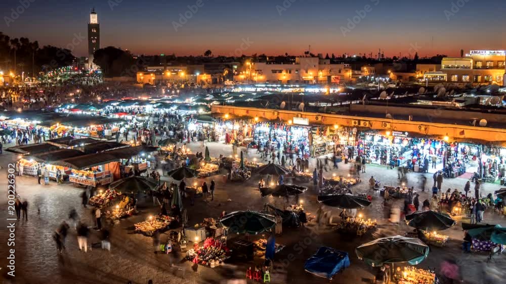 Jemaa el-Fnaa (Jamaa el Fna) square and market place in Marrakesh's medina quarter (old city), Morocco. Time lapse after sunset.  
