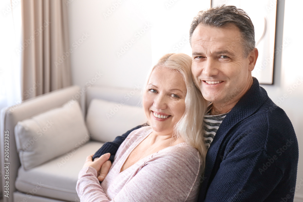 Portrait of happy pensioners at home Portrait of happy pensioners at home