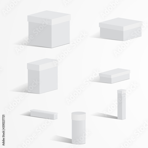 A set of white boxes with lids on a light background