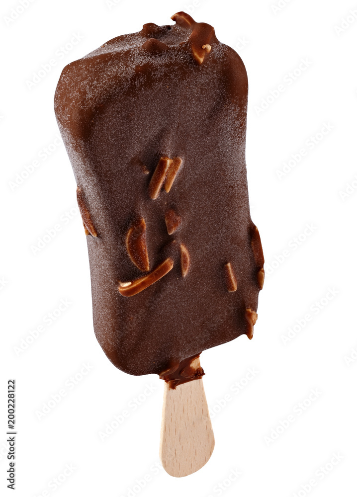 Fototapeta premium Ice cream in chocolate glaze with nuts on a wooden stick. Sweet dessert for the summer is photographed close-up. Isolated on white background.