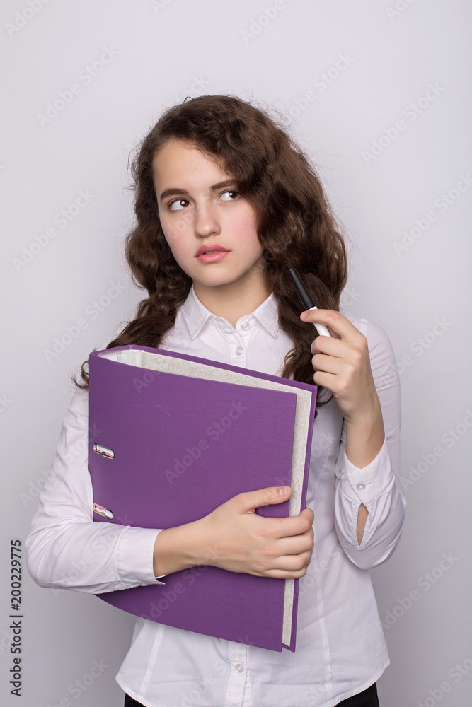 Portrait of a business woman holding folder , Isolated on white background Portrait of a business woman holding folder , Isolated on white background