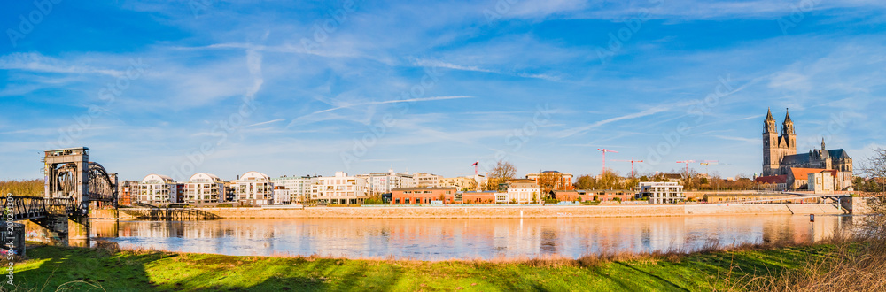 Panoramic view of Elbe, cathedral, old and modern town in Magdeburg by morning