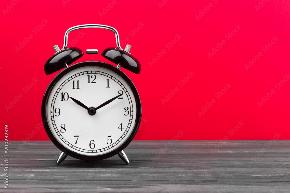 alarm clock wooden plank colored background alarm clock wooden plank colored background