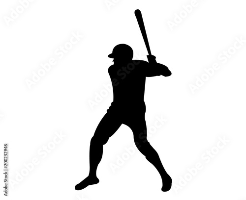 Baseball player swings a bat